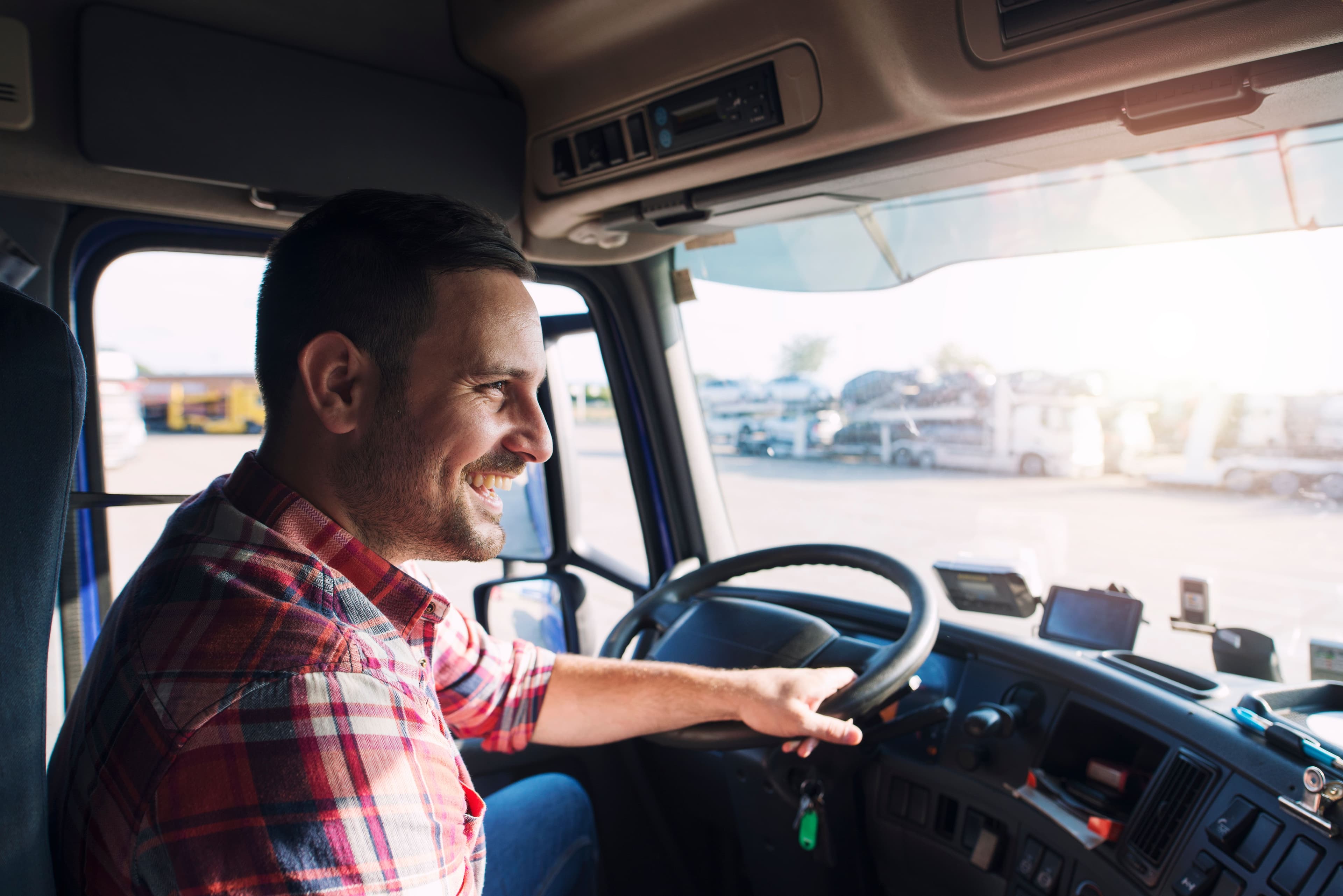 A cab view of a HGV driver setting off from a warehouse