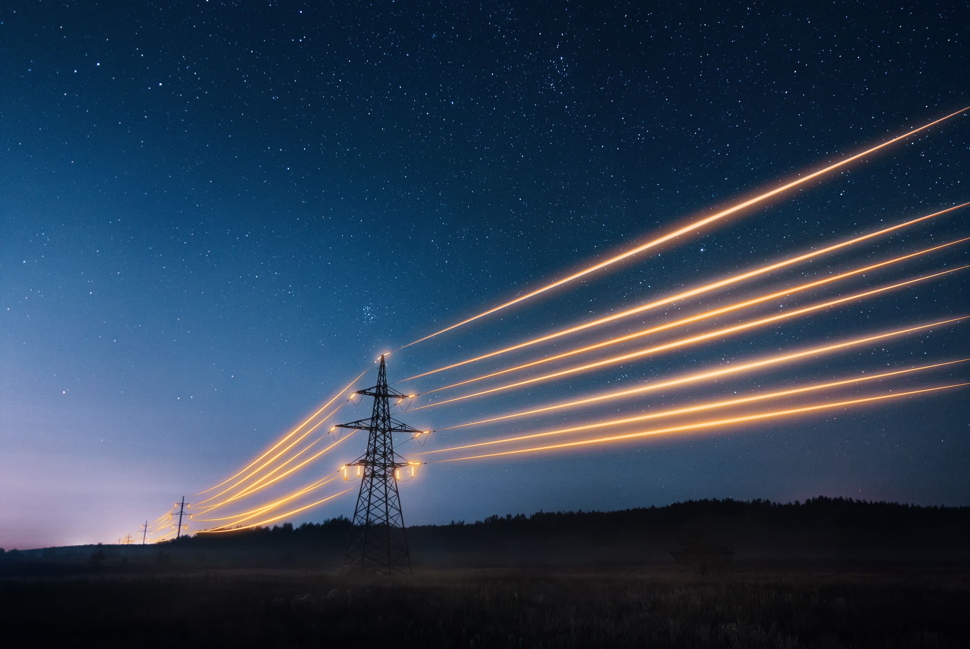 Electric pylons at night