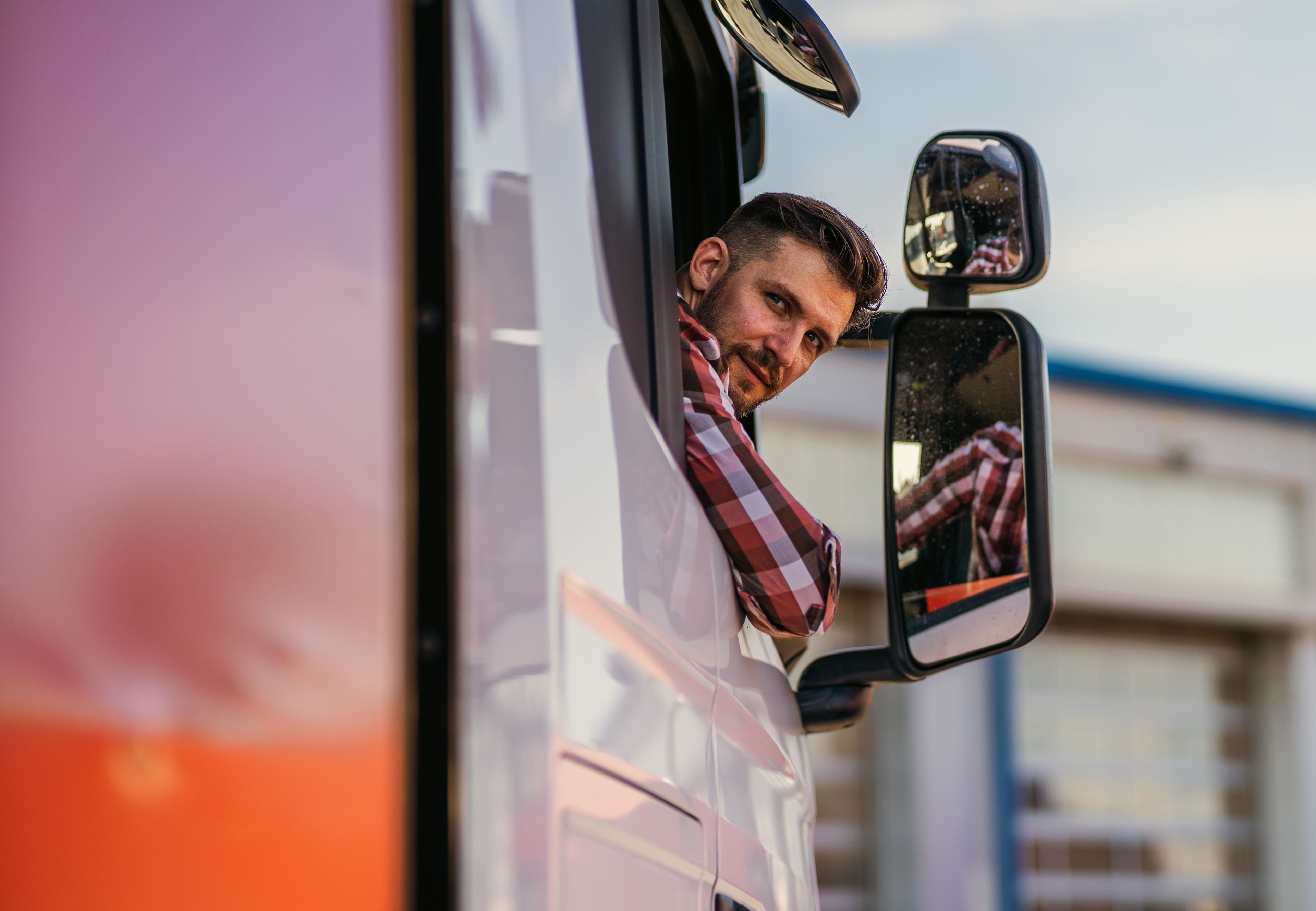 HGV driver looking out their window