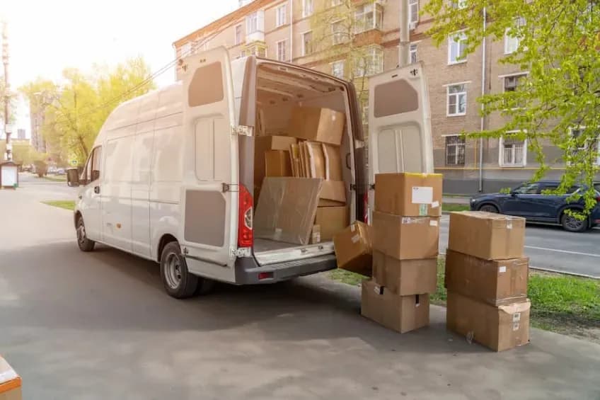boxes being unloaded from a van