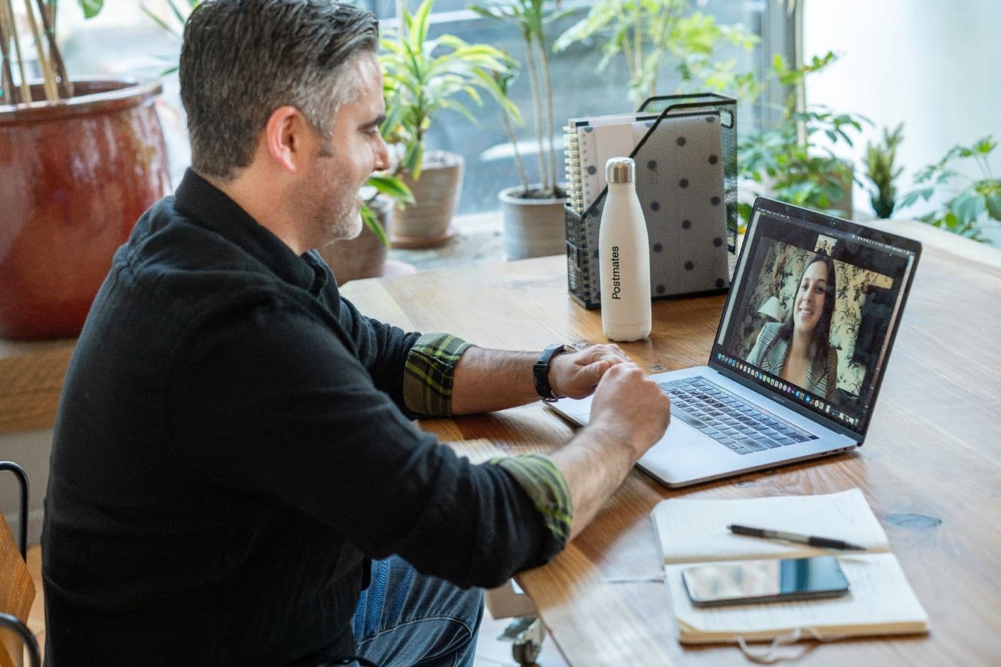 Two people on a video call from different locations