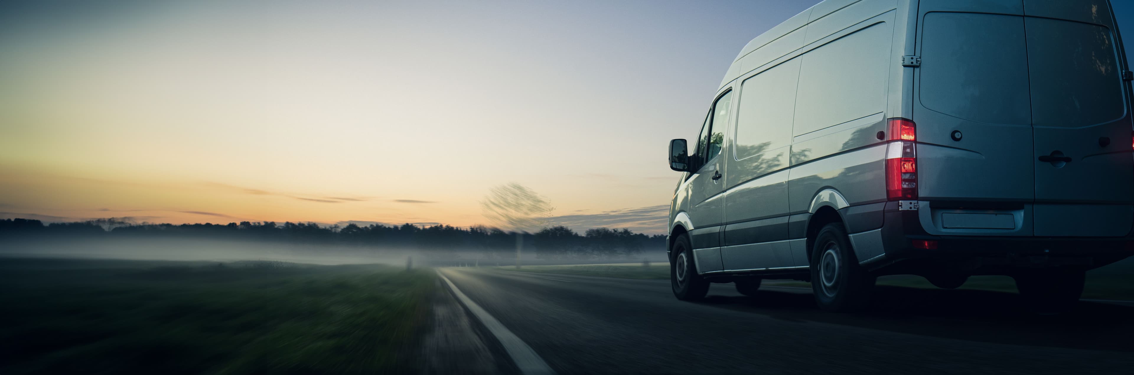 Stationary van on a misty morning