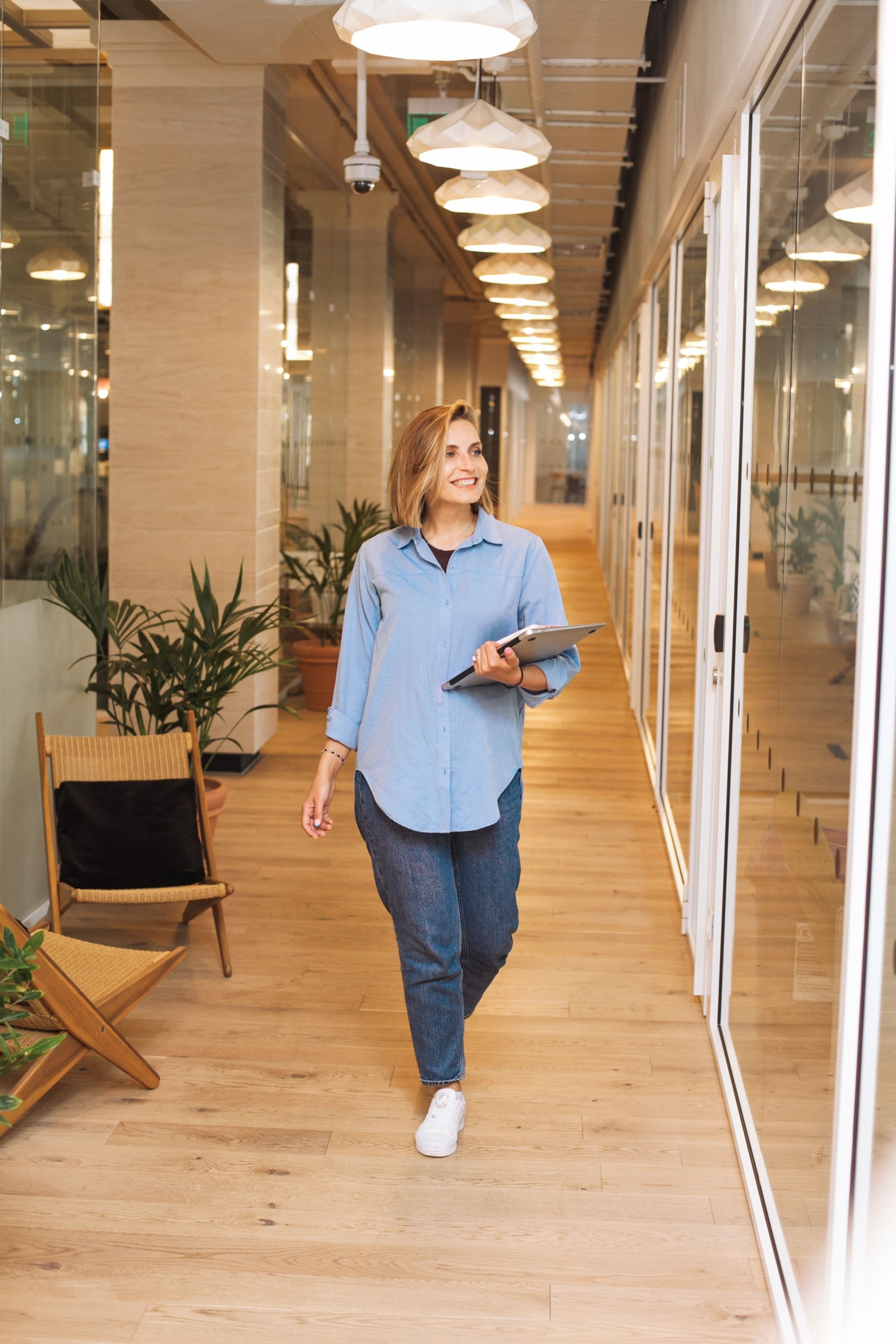 Employee walking towards a camera