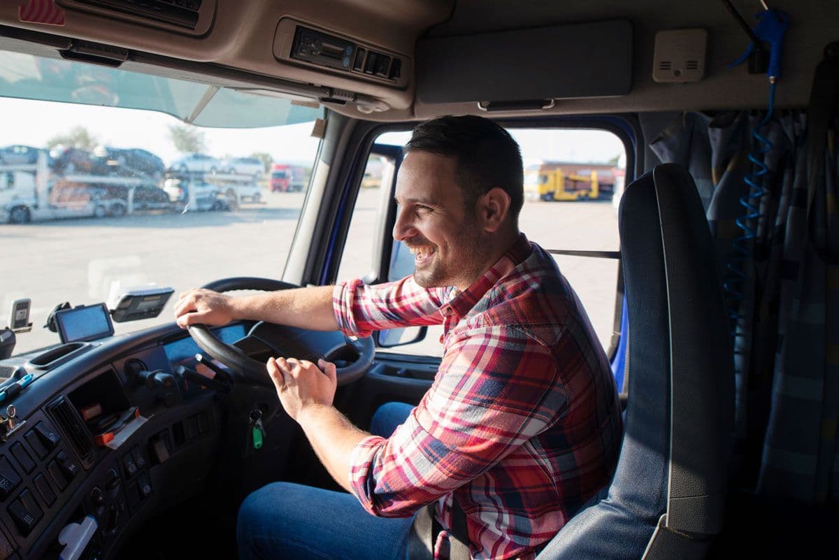 A cab view of a HGV driver setting off from a warehouse